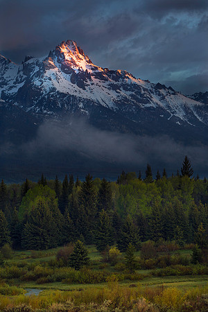 First rays on a hiking trail in Teton National Park, WY.